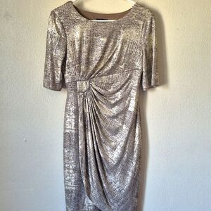 Connected Apparel Metallic Dress with Mid Sleeves and Asymetrical Waist
